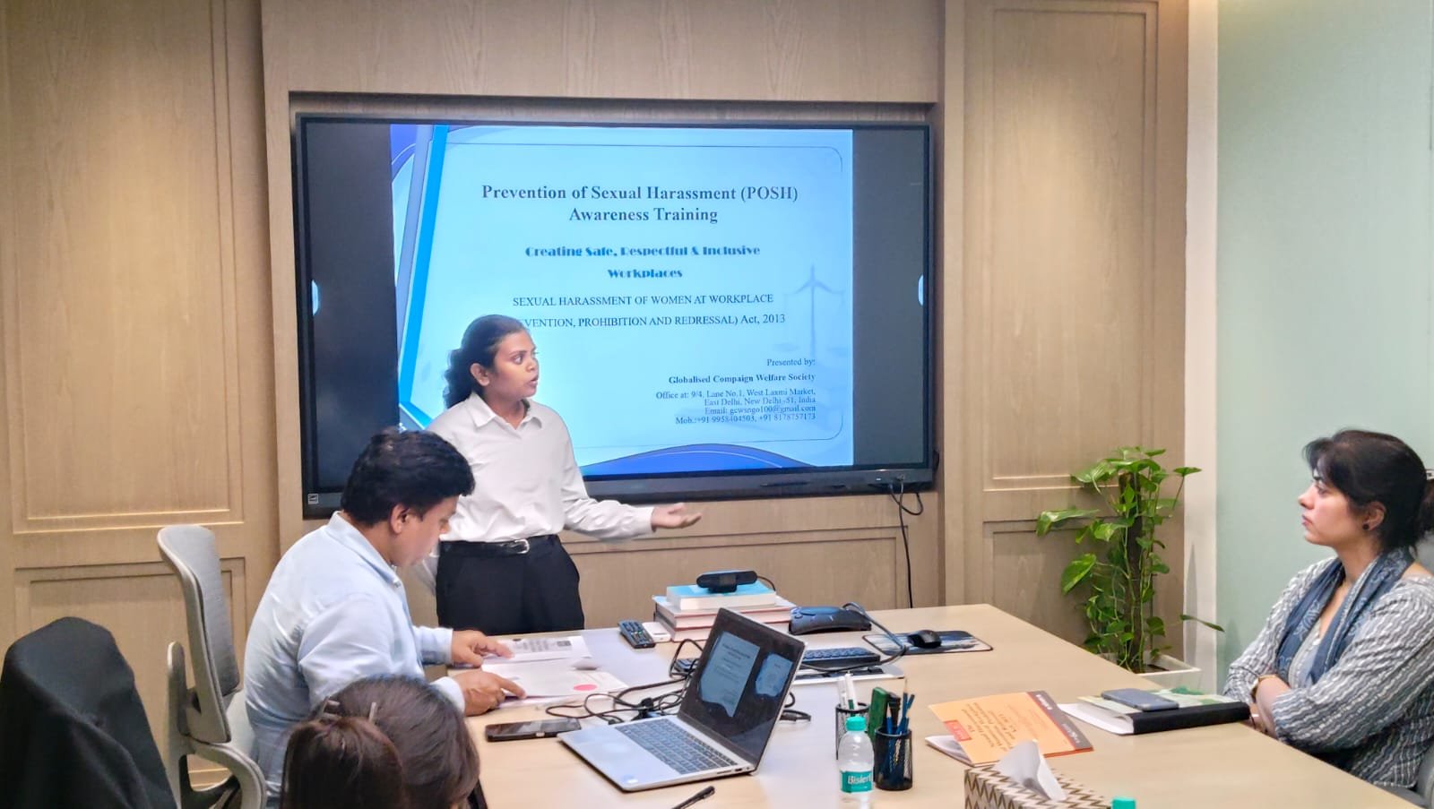 Facilitator with training participants